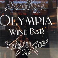 Photo taken at Olympia Wine Bar by Dean D. on 8/24/2014