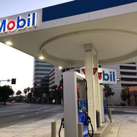 Photo taken at Mobil by Christy A. on 7/13/2019