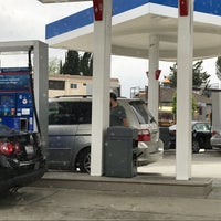 Photo taken at Mobil by Christy A. on 5/20/2018