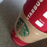 Photo taken at Starbucks by T. G. on 12/18/2012