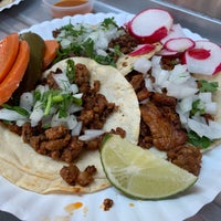 Photo taken at Tacos Los Carnales by Matthew H. on 6/23/2019