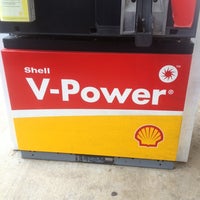 Photo taken at Shell by Julia M. on 10/23/2012