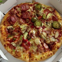 Photo taken at Domino&#39;s Pizza by hanami_line は. on 12/15/2012