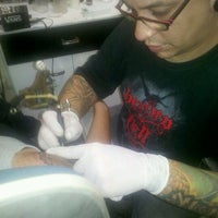 Photo taken at Seia Meia Tattoo Freak Show by Analu Q. on 10/3/2012