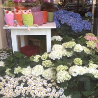 Photo taken at Flower Stand by Bella R. on 6/17/2013