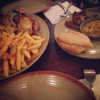 Photo taken at Nando&amp;#39;s by Heather C. on 4/4/2013