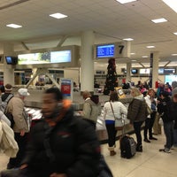 Photo taken at MDW Baggage Claim 7 by Joel W. on 12/24/2012