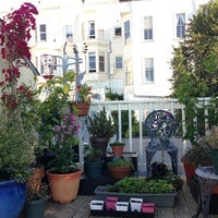 Photo taken at Hanging Garden Of The Victorian Loft by Roger B. on 5/20/2013