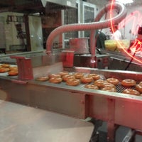 Photo taken at Krispy Kreme Doughnuts by Kevin M. on 12/13/2012