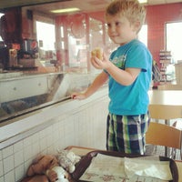 Photo taken at Krispy Kreme Doughnuts by Mandi M. on 9/25/2012