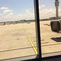 Photo taken at Gate E37 by Adam G. on 6/14/2014