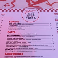 Photo taken at Delicious Pizza by Eric W. on 8/26/2023
