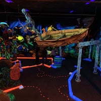 Photo taken at Glowing Greens Mini Golf by Andrew T. on 9/10/2022