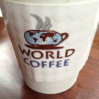 Photo taken at World Coffee by Charlie R. on 2/22/2013