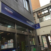 Photo taken at Mizuho Bank by Masashi M. on 3/6/2015