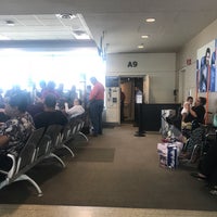 Photo taken at Gate A9 by Dean R. on 7/9/2018