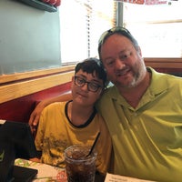 Photo taken at Red Robin Gourmet Burgers and Brews by Stephen L. on 4/29/2019