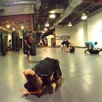 Photo taken at Octagon MMA by Chris S. on 9/27/2012
