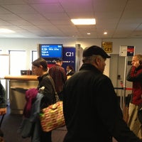 Photo taken at Gate C21 by Aaron G. on 2/27/2013