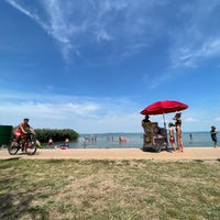 Photo taken at Balaton Beach by Légrádi Á. on 7/23/2022