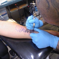 Photo taken at Traditional Tattoo &amp;amp; Empire Ink by Traditional.Tattoo E. on 11/17/2012