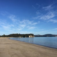 Photo taken at Cooks Beach by Lewis B. on 3/7/2014