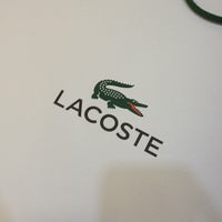 Photo taken at Lacoste by Kateryna K. on 6/14/2013