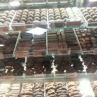 Photo taken at Rocky Mountain Chocolate Factory by Samhitha K. on 12/21/2012