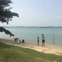 Photo taken at Pasir Ris Beach (Area 4) by Norazhar H. on 9/12/2014