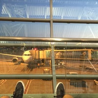 Photo taken at Gate A58 by Arne D. on 7/31/2015