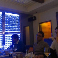 Foto tirada no(a) Indulge Brasserie and Wine por John W. em 12/21/2012