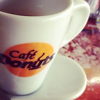 Photo taken at Café Donuts by Rogerio N. on 10/30/2013