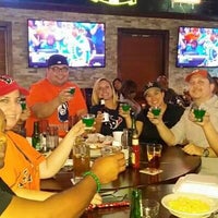 Photo taken at Coaches Sports Bar &amp;amp; Grill by Grace V. on 10/9/2015