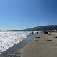 Photo taken at Zuma Beach by Andy C. on 8/12/2023