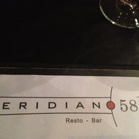 Photo taken at Meridiano 58 by Elizabeth d. on 4/14/2013