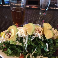 Photo taken at Arepazo Tapas Bar Grill by Heather M. on 3/21/2015