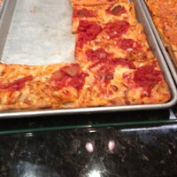 Photo taken at Basilicos Pizzeria by Bronwynn C. on 11/24/2012