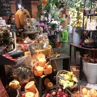 Photo taken at Aoyama Flower Market by nyanco_me on 10/21/2012