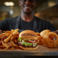 Photo taken at BurgerFi by Business o. on 2/21/2020