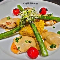 Photo taken at Chez Henri by Business o. on 3/7/2020