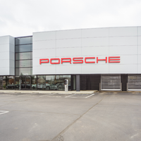 Photo taken at Tom Wood Porsche by Business o. on 3/28/2020