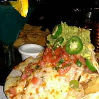 Photo taken at Agavé Mexican Bistro by Renee V. on 4/16/2012