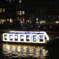 Photo taken at Amsterdam Christmas Canal Parade by MK on 12/15/2012