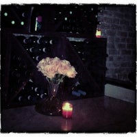 Photo taken at Wine &amp;amp; Roses Wine Bar &amp;amp; Cafe by Roberto Kai H. on 3/11/2012