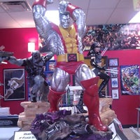 Photo taken at Heroes Landing Comic Shop by Tristan U. on 10/15/2011