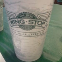 Photo taken at Wingstop by Raquel A. on 1/4/2012