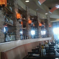 Photo taken at Travinia Italian Kitchen and Wine Bar by Corey C. on 1/18/2012