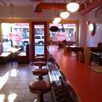 Photo taken at Moe&amp;#39;s Burger Joint by Vinti S. on 4/25/2011