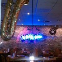 Photo taken at Red Hot &amp;amp; Blue  -  Barbecue, Burgers &amp;amp; Blues by Dre D. on 1/25/2012