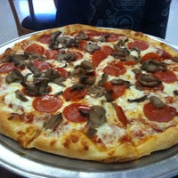 Photo taken at Brothers Pizzeria by Tim on 12/27/2011